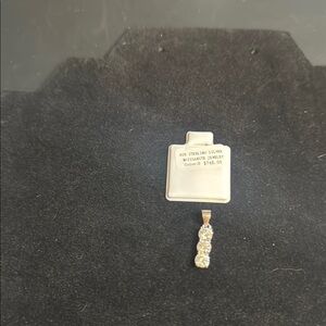 Elegant Silver Pendant with Clear Stones